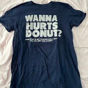 Hurts Donuts graphic t shirt.